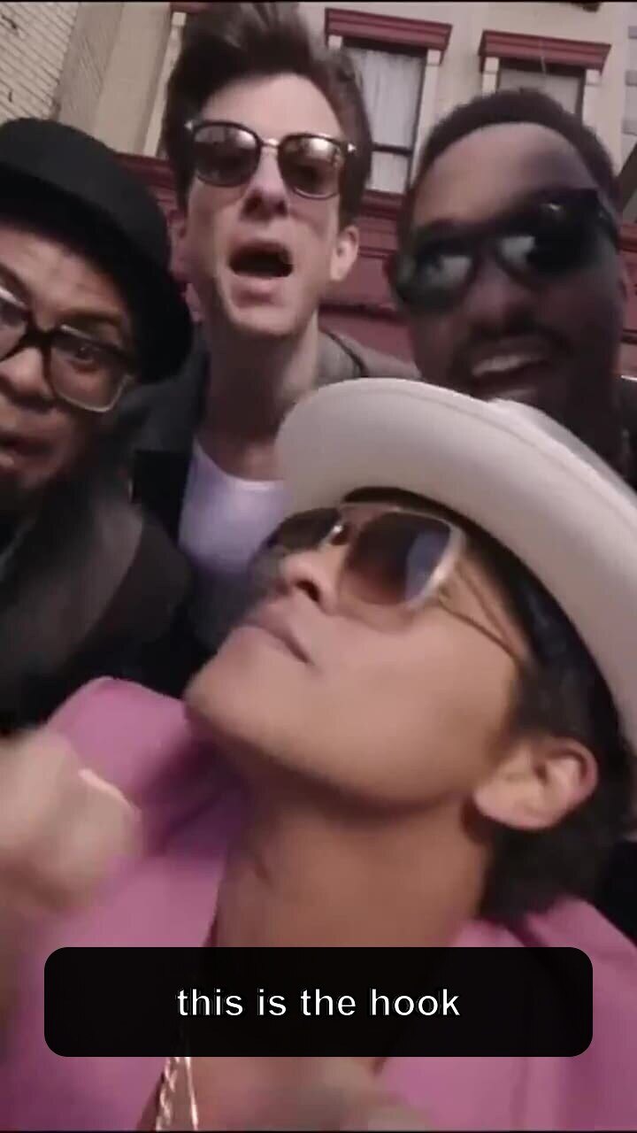Vertical music video clip with the key reaction centered and subtitled